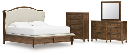 Sturlayne King Upholstered Panel Bed with Mirrored Dresser and Chest