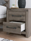 Graystorm Queen Panel Bed with Mirrored Dresser and Nightstand