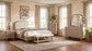 Lucaire Eastern King Upholstered Panel Bed Sandstone