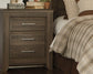 Juararo Queen Poster Bed with Mirrored Dresser, Chest and 2 Nightstands